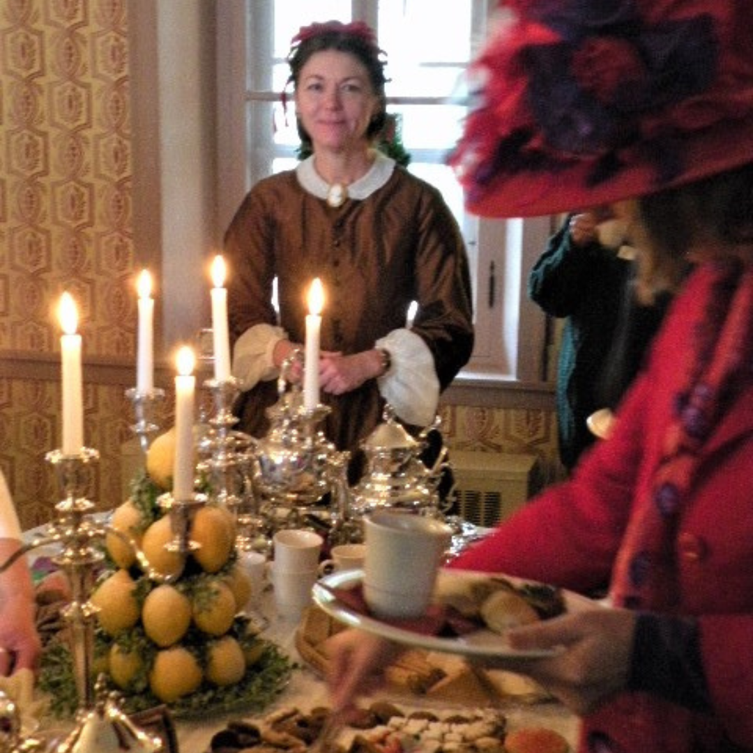 Victorian Tea with candles, cookies and silver tea set