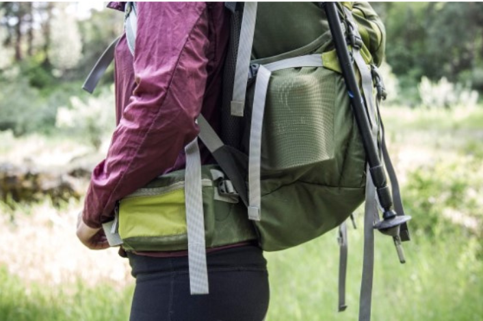 Woman with hiking backpack