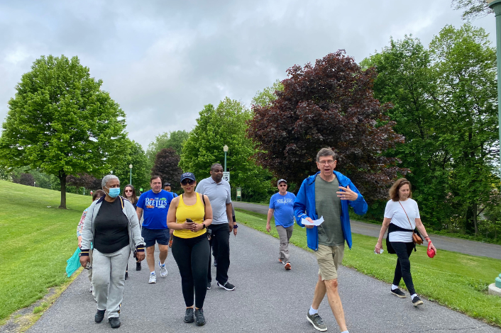 Group of people walking on a trail