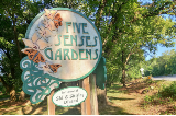 Wooden sign announcing the Five Senses Gardens on the Capital Area Greenbelt