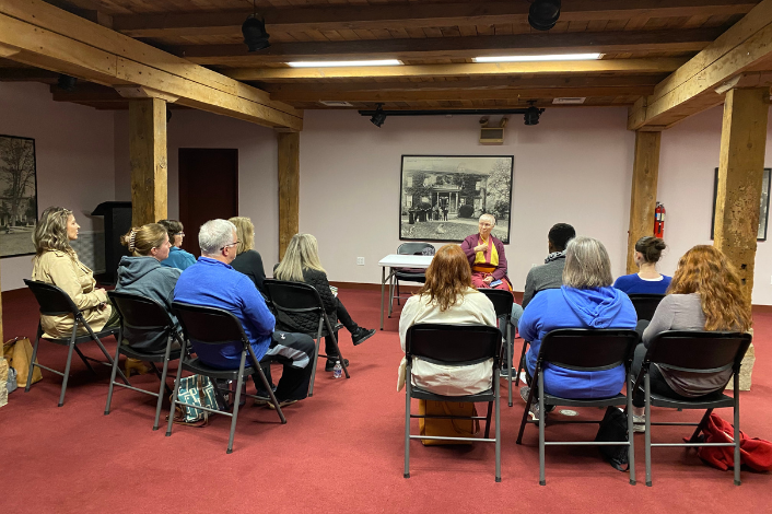 Group of people seated for a program