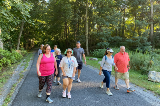 A group of people walking at Wildwood Park