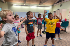 Young children playing in a classroom setting