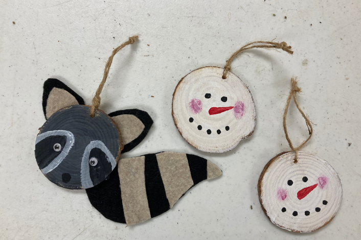 Racoon and Wooden Snowman Ornaments made out of natural materials