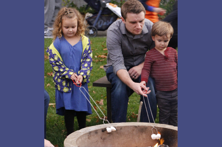 Family roasting marshmallows